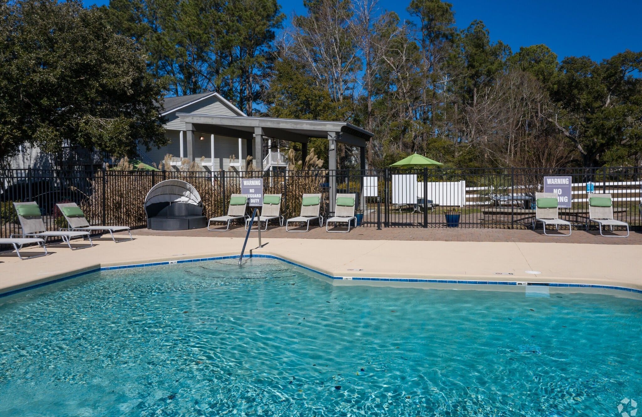 Hawthorne Commons outdoor salt-water pool with ample sundeck with lounge seating